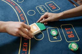 Gaple Online game interface on kenzototo link showing domino tiles and game board